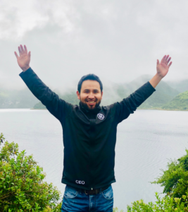 Joel Callanpuna Joel poses by the rainbow mountains.